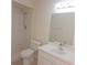 Bathroom featuring a shower, toilet, sink with large mirror, and tiled flooring at 513 Seasons Ct, Winter Springs, FL 32708