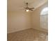 Bright bedroom featuring a ceiling fan, tile flooring, and natural light at 513 Seasons Ct, Winter Springs, FL 32708