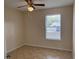 Bedroom with ceiling fan and tile floors at 513 Seasons Ct, Winter Springs, FL 32708