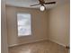 Bedroom featuring tile flooring, a ceiling fan with light and a window with blinds at 513 Seasons Ct, Winter Springs, FL 32708