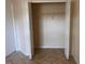 Open closet with wire shelving, tiled floor and neutral colored walls at 513 Seasons Ct, Winter Springs, FL 32708