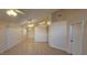 Open living room with tile flooring, neutral walls, and natural light creates an inviting space at 513 Seasons Ct, Winter Springs, FL 32708
