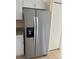 Stainless steel refrigerator features a water dispenser and ample storage space at 513 Seasons Ct, Winter Springs, FL 32708