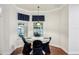 Bright breakfast nook with bay windows, perfect for enjoying morning coffee at 583 Treehouse St, Winter Springs, FL 32708