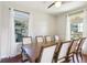 Formal dining room with a large table, seating for eight, and natural light at 583 Treehouse St, Winter Springs, FL 32708