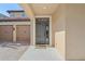 Close up of the front door featuring a classic door and brick driveway at 583 Treehouse St, Winter Springs, FL 32708