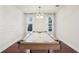 Game room features hardwood floors, pool table, and decorative molding on the wall at 583 Treehouse St, Winter Springs, FL 32708