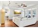 Cozy living room featuring wood floors and plenty of natural light at 583 Treehouse St, Winter Springs, FL 32708