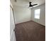 Bedroom with a ceiling fan and lots of space at 9436 Westside Hills Dr, Davenport, FL 33896