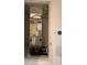 HVAC system in a small closet with digital thermostat on the wall at 9436 Westside Hills Dr, Davenport, FL 33896
