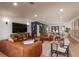 Open-concept living room with comfortable seating, stylish accents, and a spacious layout at 9575 Ne 306Th Ct, Fort Mc Coy, FL 32134
