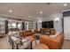Inviting living area connected to dining space, featuring modern decor and abundant natural light at 9575 Ne 306Th Ct, Fort Mc Coy, FL 32134