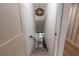 Long staircase with carpet and modern chandelier at 9575 Ne 306Th Ct, Fort Mc Coy, FL 32134