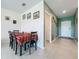 Cozy dining area adjacent to the entry, ideal for Gathering meals and entertaining guests at 993 Calico Pointe Cir, Groveland, FL 34736