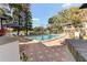 Outdoor pool, lounge chairs, and cabanas at 1100 Delaney Ave # F204, Orlando, FL 32806