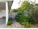 Stone pavers and lush greenery create a private backyard oasis at 12 S Lawsona Blvd, Orlando, FL 32801