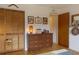 Charming bedroom featuring a wooden dresser, closet with louvered doors, and stylish decor at 12 S Lawsona Blvd, Orlando, FL 32801