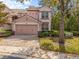 Charming two-story home featuring a brick driveway and well-maintained landscaping at 1431 Milledge Ln, Davenport, FL 33896