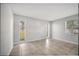 Bright, neutral bedroom featuring tile floors, a window and neutral paint at 161 Laurel Way, Kissimmee, FL 34743