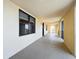 Well-lit hallway with a neutral color scheme and modern design elements at 16300 County Road 455 # 607, Montverde, FL 34756