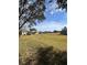 Expansive backyard showing the proximity to neighboring homes at 21636 King Henry Ave, Leesburg, FL 34748