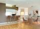 Bright living space with an eat-in kitchen and dining area with views to the living room at 21636 King Henry Ave, Leesburg, FL 34748