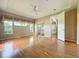 Bright main bedroom with hardwood floors, large windows and plenty of natural light at 21636 King Henry Ave, Leesburg, FL 34748