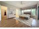 Staged main bedroom with en-suite bathroom and walk-in closet at 21636 King Henry Ave, Leesburg, FL 34748