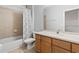 Well-lit bathroom featuring a vanity and a tub-shower combination at 3257 Villa Strada Way, Orlando, FL 32835