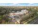 Aerial view of a commercial building with a Chase Bank branch and other businesses, and ample parking at 3257 Villa Strada Way, Orlando, FL 32835