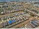 An aerial view shows a neighborhood featuring well-maintained homes with manicured lawns and orderly streetscapes at 337 Regency Ridge Dr, Davenport, FL 33837