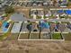 Aerial view of homes featuring solar panels in a residential neighborhood at 337 Regency Ridge Dr, Davenport, FL 33837