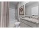 Bathroom featuring a shower-tub combo with a neutral shower curtain and granite vanity countertop at 3374 Private Oak Dr, Apopka, FL 32703