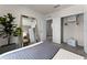 This bedroom features a large mirror, closet, and neutral tones creating a calming retreat at 3380 Private Oak Dr, Apopka, FL 32703