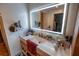 Bright bathroom with a lit mirror and a countertop sink at 3624 Chelsea St, Orlando, FL 32803