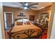 Bedroom with decorative rug, hardwood floors, ceiling fan, and nice natural lighting at 3624 Chelsea St, Orlando, FL 32803