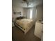 Cozy bedroom features a comfortable queen-size bed, soft lighting, and ample closet space at 3807 March Ave, Orlando, FL 32806