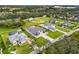 Aerial view showcases a luxurious home, highlighting its spacious backyard, private pool, and landscaped surroundings at 3845 S Stillwood Ln, Lake Mary, FL 32746