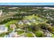 Stunning aerial view of luxury homes nestled within lush greenery, showcasing the community's spacious layouts and serene setting at 3845 S Stillwood Ln, Lake Mary, FL 32746