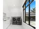 Modern laundry room with high-end washer and dryer, ample counter space, and natural light, a functional workspace at 3845 S Stillwood Ln, Lake Mary, FL 32746