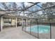 Relaxing pool with screened enclosure offering a refreshing escape in a private backyard at 388 Winnway St, Apopka, FL 32712