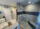 Nicely remodeled bathroom with frameless glass shower enclosure at 3913 Rose Of Sharon Dr, Orlando, FL 32808