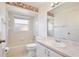 Bright bathroom featuring a shower-tub combo at 4702 Kati Lynn Dr, Apopka, FL 32712