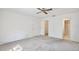 This bedroom has an ensuite bathroom and walk-in closet at 4702 Kati Lynn Dr, Apopka, FL 32712