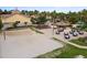 Exterior scene showcasing beach volleyball court, tiki bar, and resort-style amenities in a tropical setting at 487 La Mirage St, Davenport, FL 33897