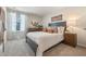 Bedroom with plush carpet, natural light, neutral walls and decor at 512 Preston Cove Dr, St Cloud, FL 34771