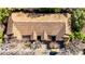 Aerial view of the home features tile roofing, mature trees and driveway parking at 6855 Sperone St, Orlando, FL 32819