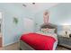 Bright bedroom with closet, night stand and lamp at 7736 Brofield Ave, Windermere, FL 34786