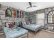 Whimsical ' bedroom featuring themed decor, twin beds, and unique wall art at 8874 Qin Loop, Kissimmee, FL 34747