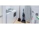 Functional laundry room with appliances and storage solutions, enhancing household efficiency and organization at 8940 Rhodes St, Kissimmee, FL 34747